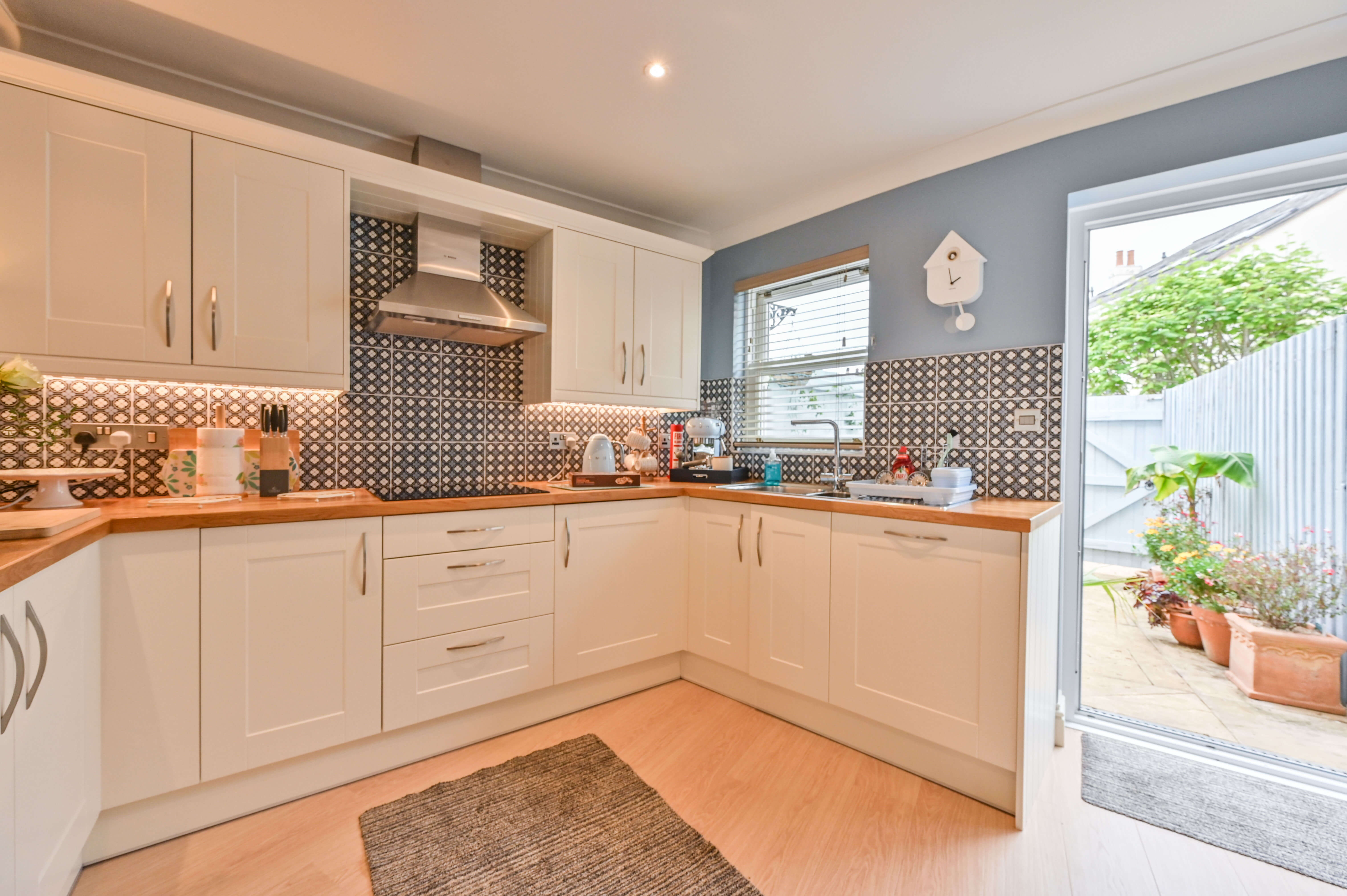 Kitchen with access to the courtyard - Lisburne Place Luxury self catering accommodation in Torquay.